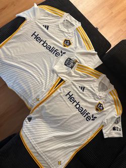 La galaxy jerseys small and medium