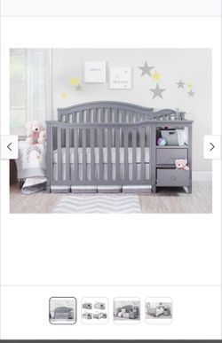 Baby crib with changing table and  drawers