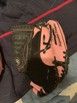 Girls pink softball glove and helmet