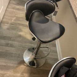 4 Black and Silver Bar Stools 