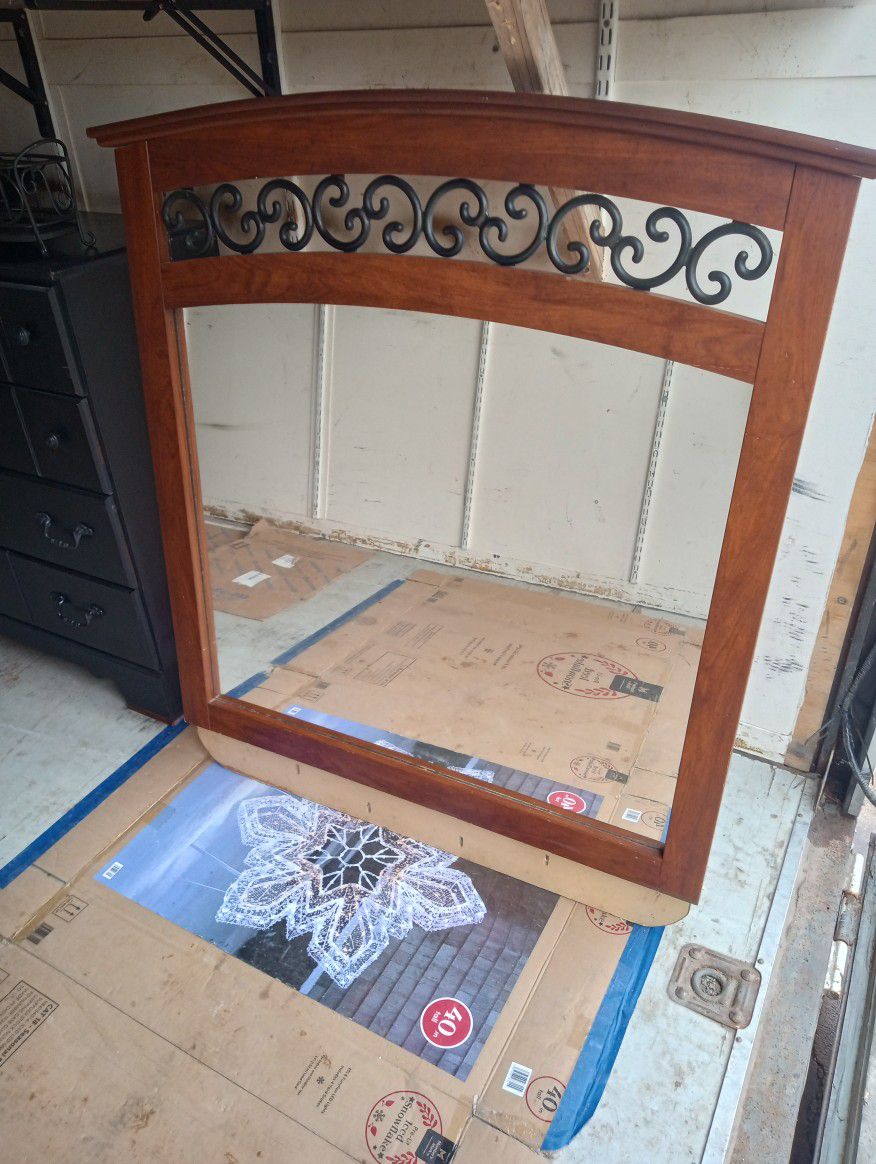 Mirror and Eight Drawer Chest. 