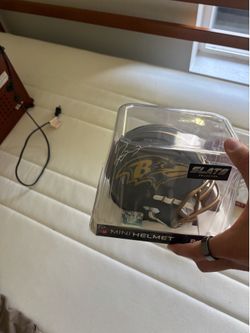 Mini helmet  ravens and Adrian Peterson when he was at Oklahoma
