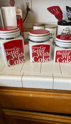 Coca Cola canisters