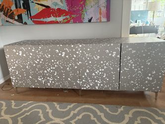 Free ——Storage or TV stand or just because you need something to hide your stuff in looks modern great place to hide all your stuff