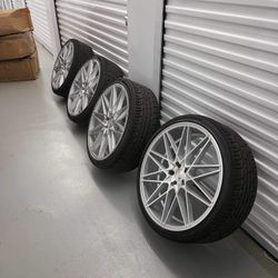 22x9 Silver & Machined Foreign Rims & Tires
