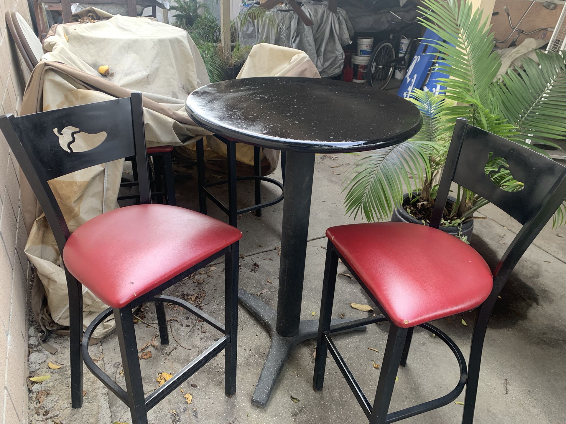 Tall Black Table  With3  Red Cushion Chairs 