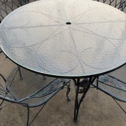 Wrought Iron Table And 4 Chairs W/ Glass Top