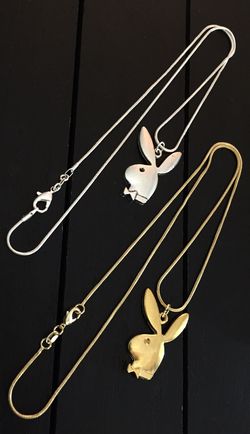 Two 20” Playboy Bunny necklaces (real silver and real gold)