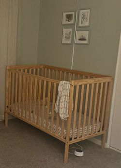 Crib with bed rail