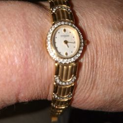 Dangling Watch with clasp.
