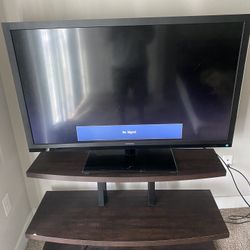 tv stand and 50in flat screen