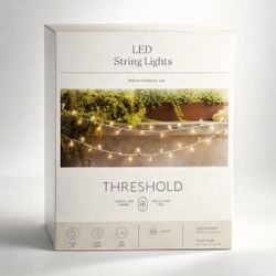 Threshold LED string lights, warm white, indoor / outdoor use.  Approx 20 ft lighted length 100 LED lights Plug-in style Warm white color  Great for p