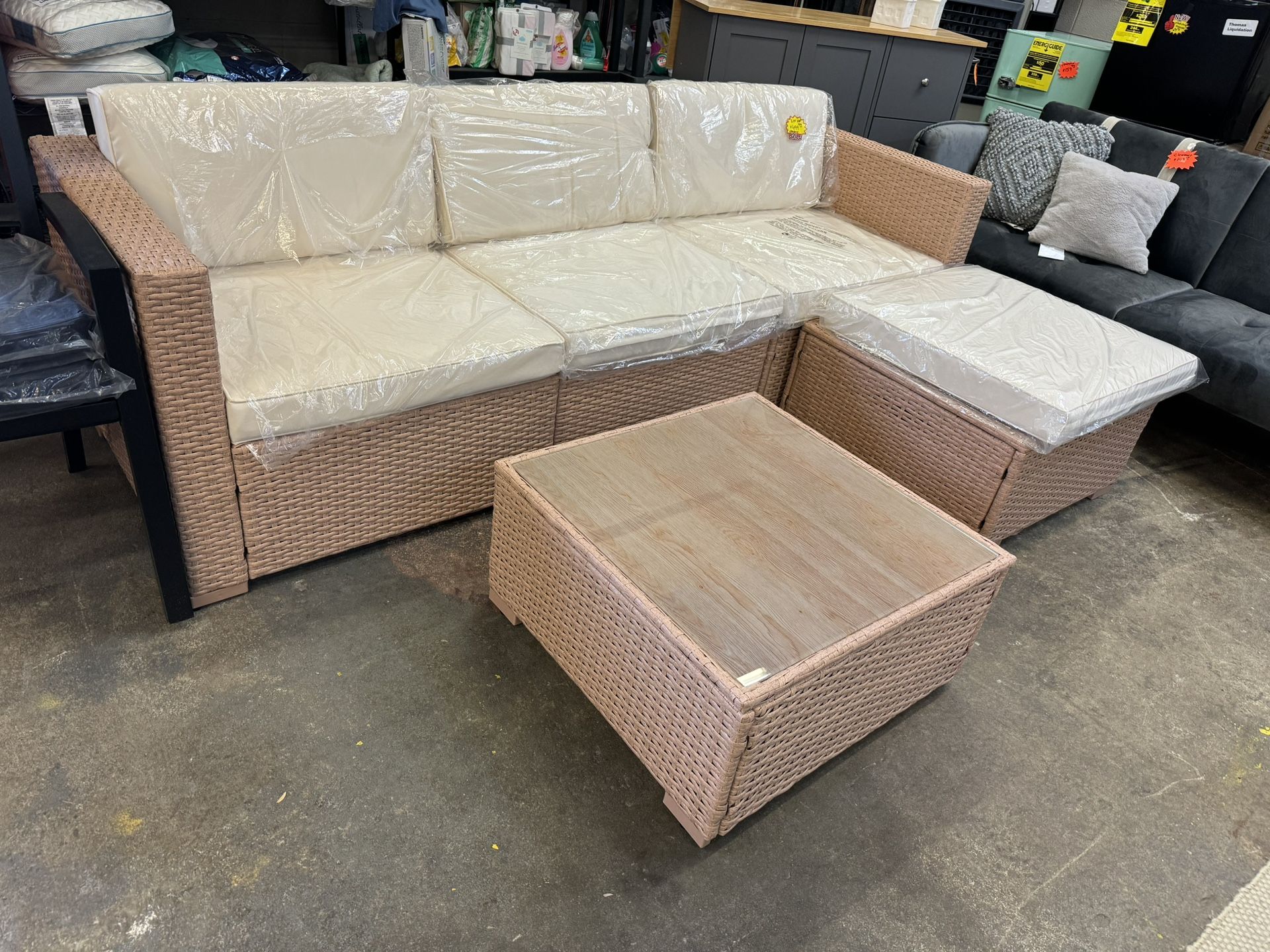 New Outdoor Sectional And Table Light Brown And Cream Cushions