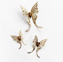 Wonderful Vintage Gold Metal and Wood Moth / Butterfly Wall Decor - Set of 3   These pieces are crafted from light weight metal with carved wood bodie