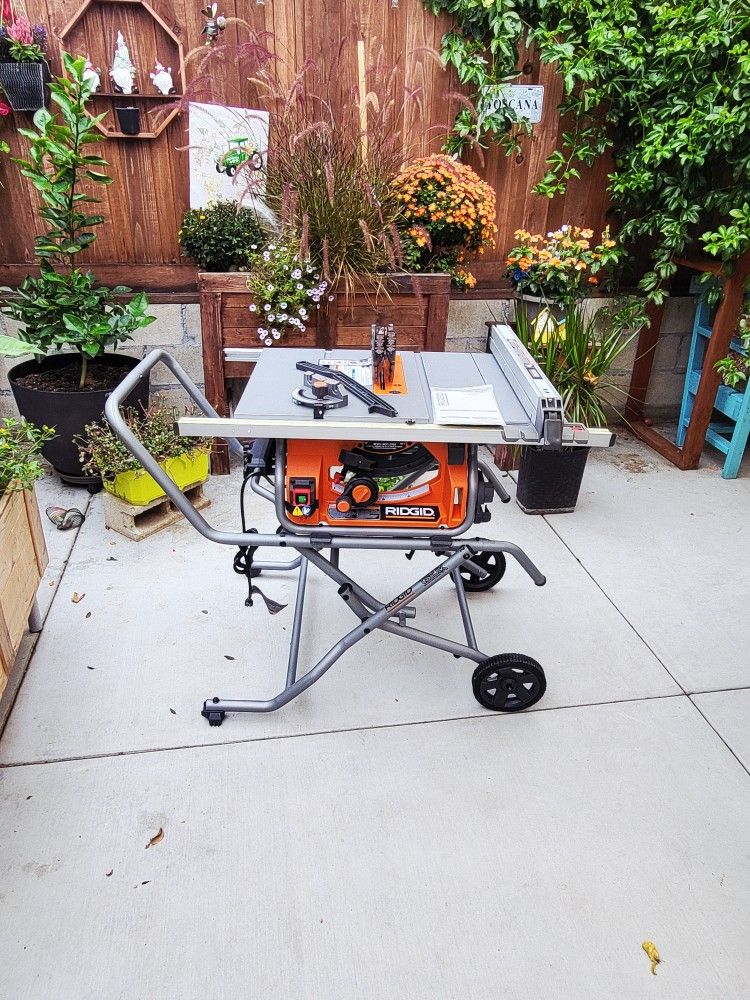 Ridgid (Open never used)15 Amp 10 in. Portable Corded Pro Jobsite Table Saw with Stand