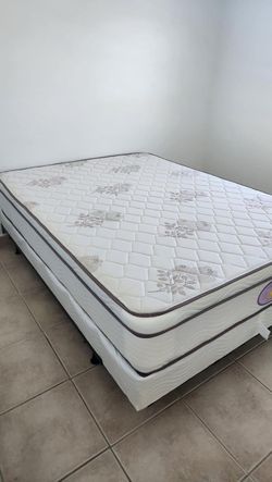 New queen mattress and box spring. 2 pc bed frame is not included