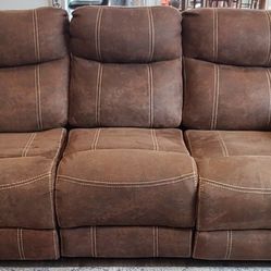 Couch (3 seat) and Recliner. Both Microfiber. Couch has 2 recliners. All manual recliners.