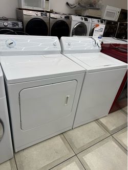 Kenmore top load washer and electric dryer set