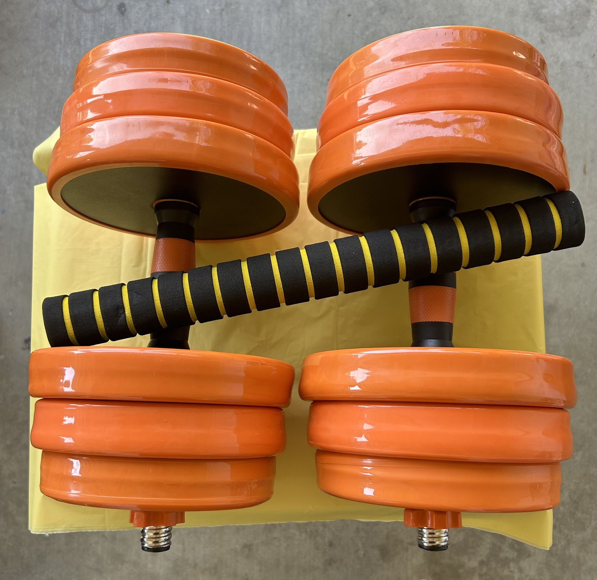 66 Pounds Dumbbells 33 pounds each they come with the extra bar so you can connect them and work out for your chest