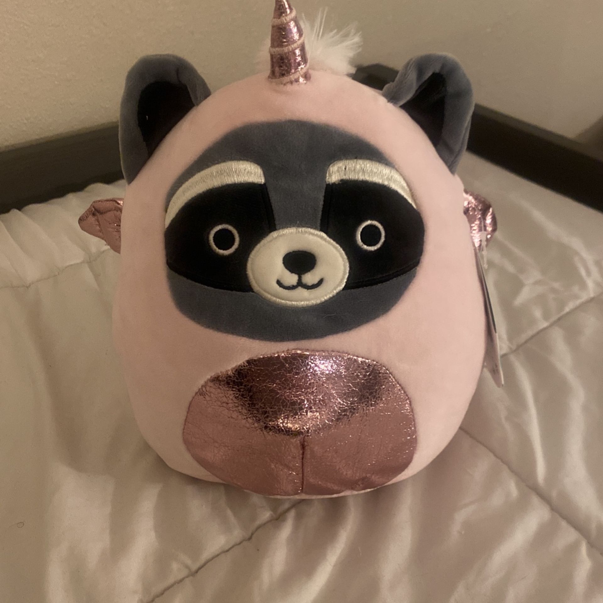 Reg. Size Squishmallow (8 in) Rocky the Raccoon In unicorm Costume.