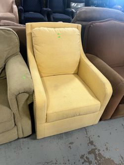 Comfy modern yellow armchair (in store)