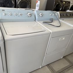 Kenmore top load washer and electric dryer set