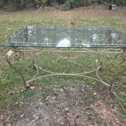 Glass table with metal frame