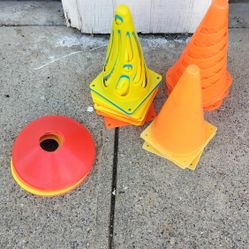 Cones, sticks, pennies and clipboard for athletic training