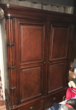 Wooden armoire with drawers