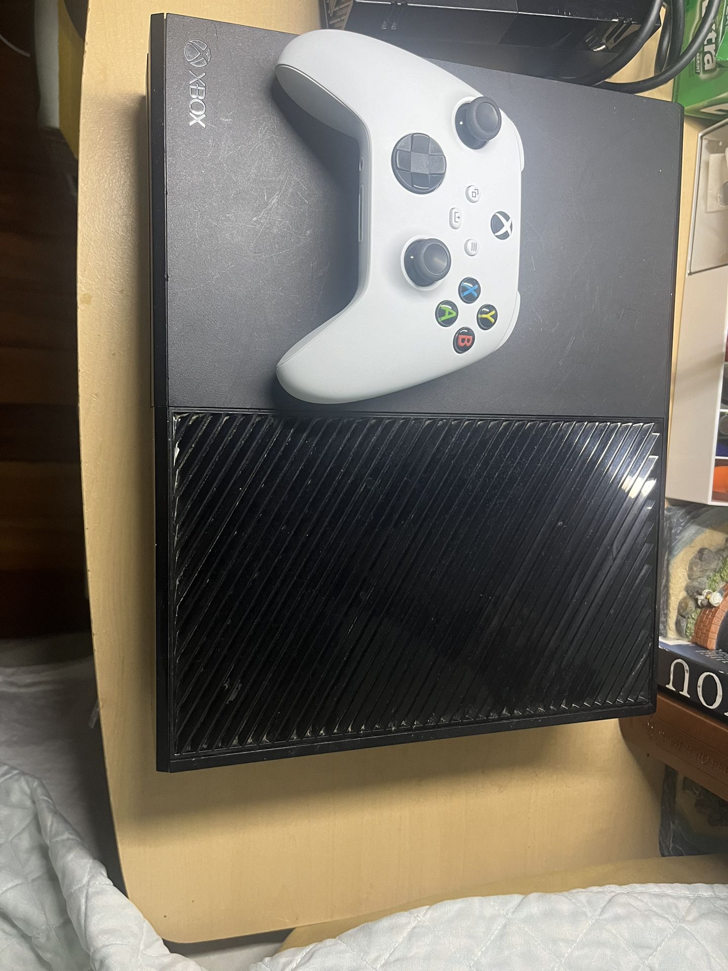Xbox One with controller, headset, recharge battery and station.