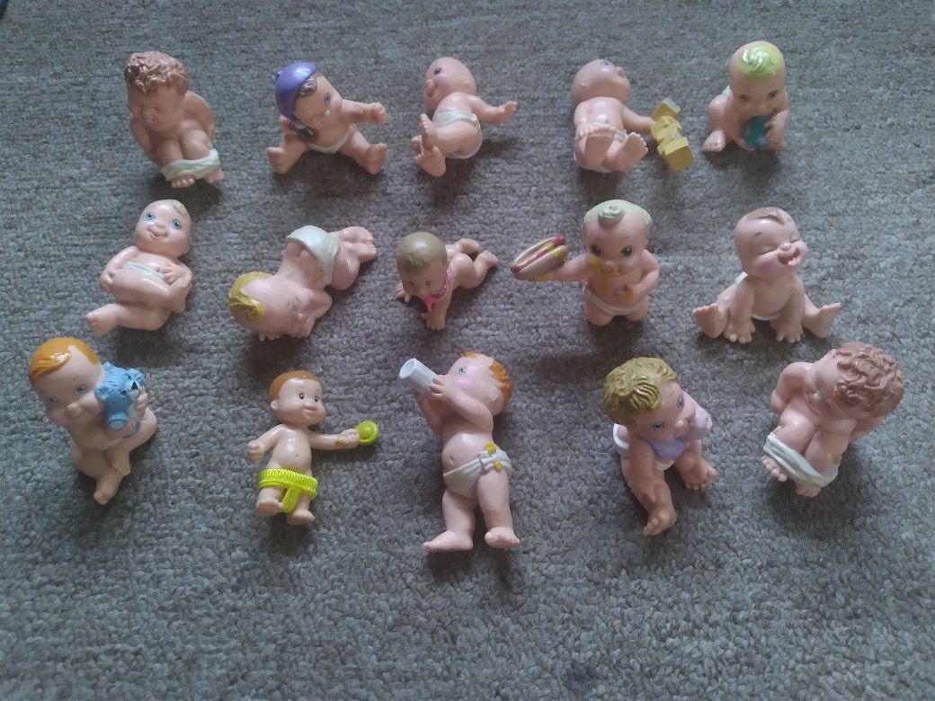 Vintage collection of 15 Magic diaper babies figurines by Galoob