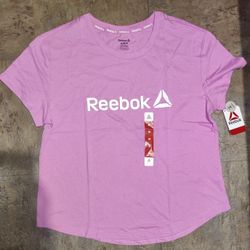 NEVER USED. Reebok Women's Short Sleeve T-shirt Size Medium 
