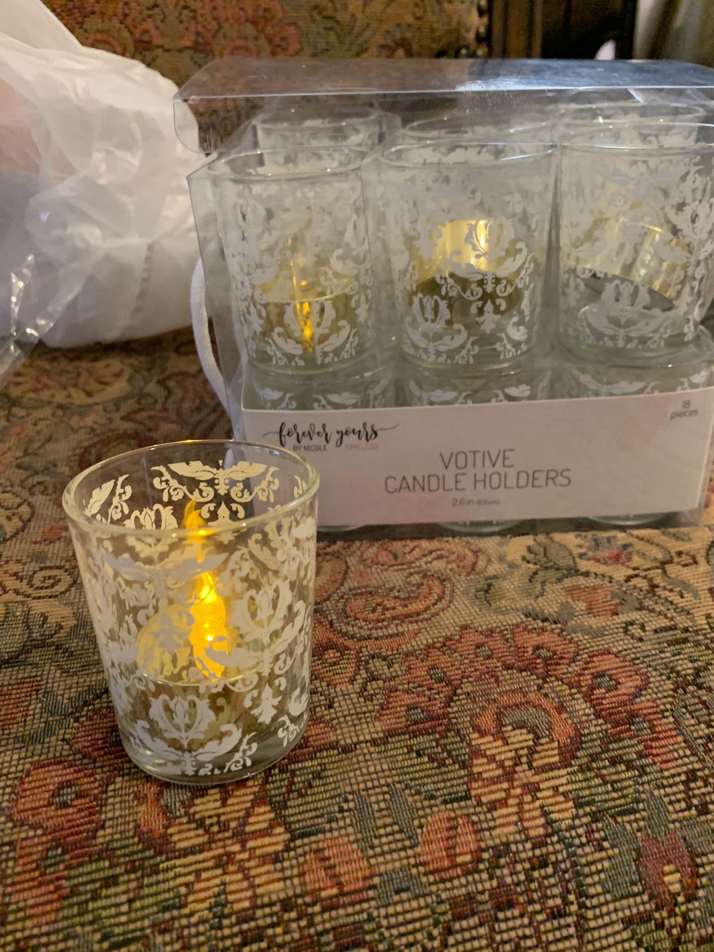 Votive candle holder and gold tea lights