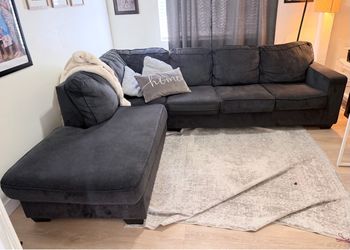 Title:** Charcoal Gray L-Shaped Sectional with Chaise Lounge
