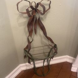 Metal rustic wall mounted planter with bow design. 33 inch tall ! Vintage/ cottage/ farmhouse.