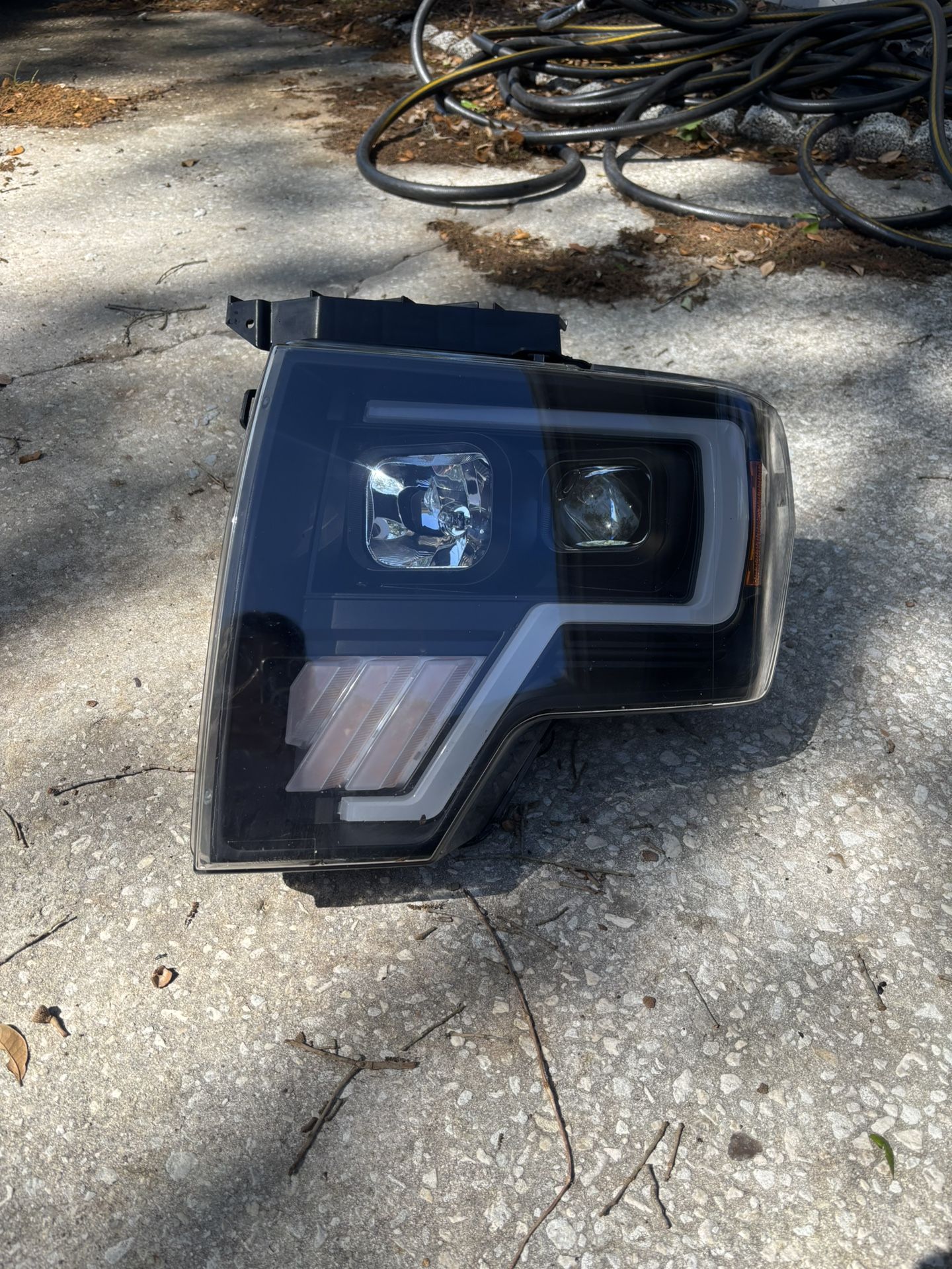 DRIVER SIDE ONLY 2009-14 Ford F150 Headlight