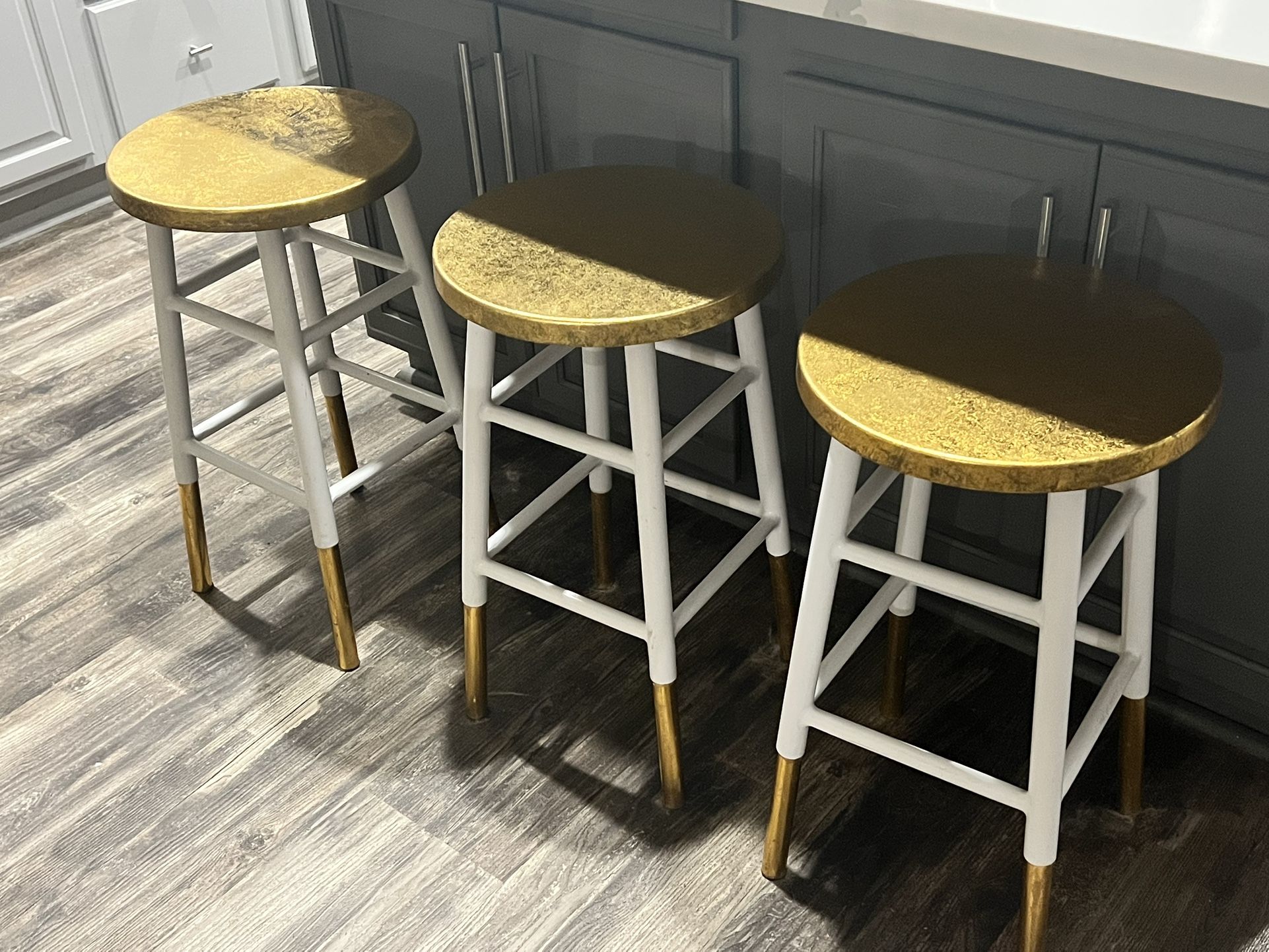 3 Gold/ white Metal Stools