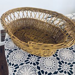 Small wicker pet bed