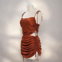 Gorgeous satin skirt set size Medium strings on the side can be adjusted to make the skirt longer