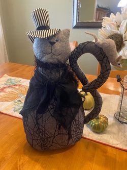 Halloween stuffed cat with mouse. Weighted bottom. Hand made with striped hat & mesh shawl. 17 x 10