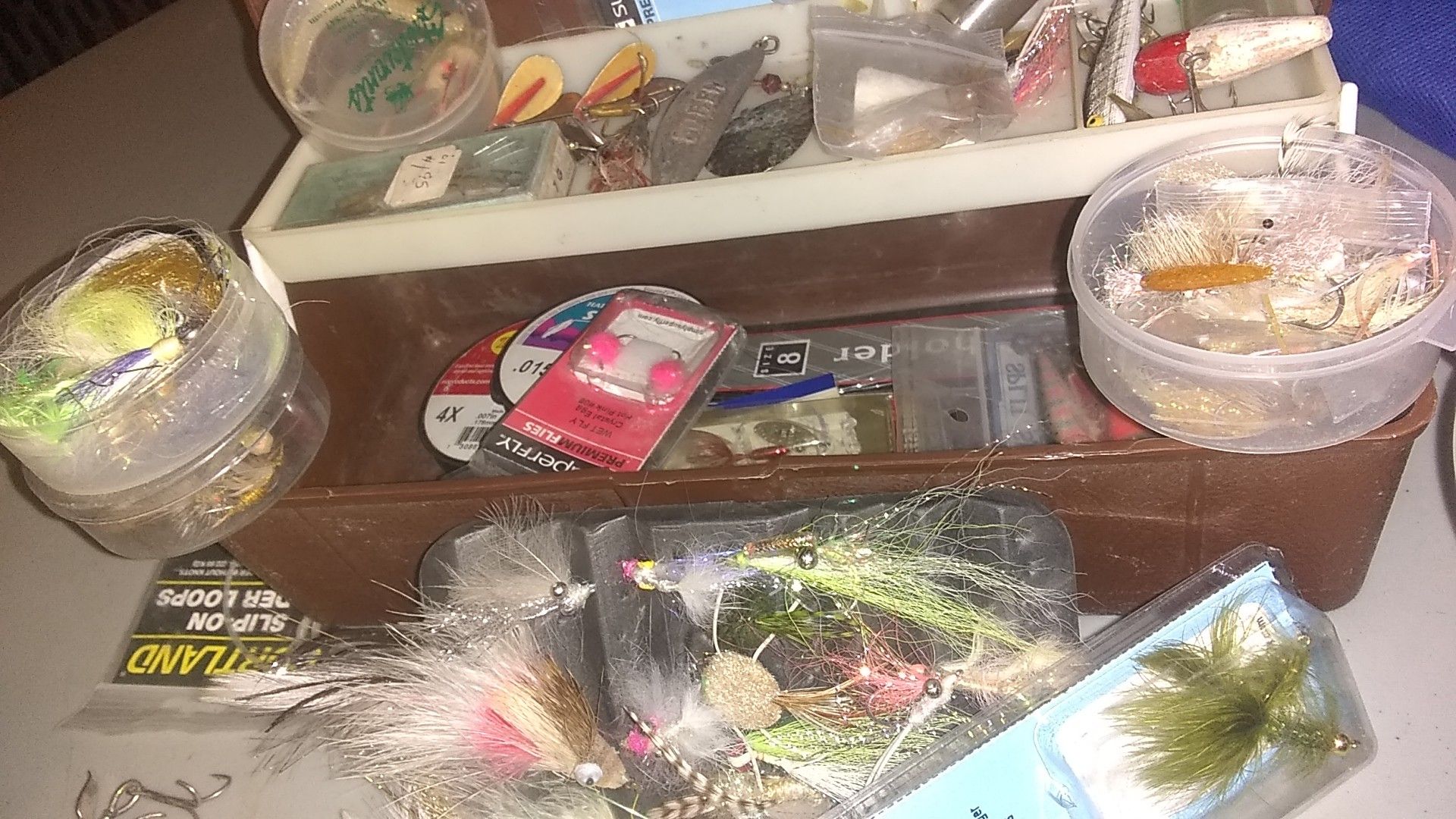 Vintage tackle box with flies and lures