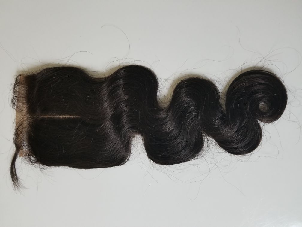 18 Brazilian human hair lace closure bodywave middle part