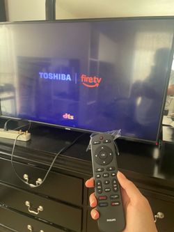 “49in”Toshiba Fire TV Edition, works great, includes remote and legs. Has light cosmetic scratches🐾