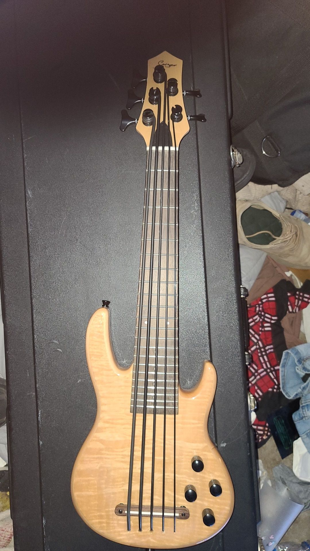 Miniature 5 string electric bass guitar with piezo pick up .