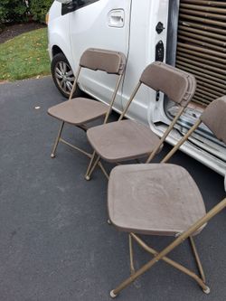Brown folding plastic chairs