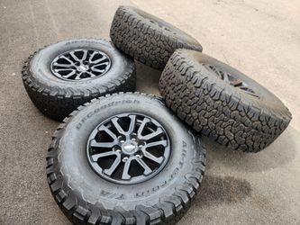 17" ford raptor matte black factory wheels and tires