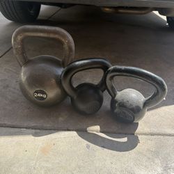 Kettlebells weights 53lbs single and 2-15 pair