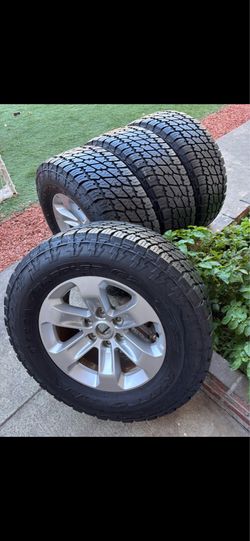 Chevy Silverado stock rims and tires