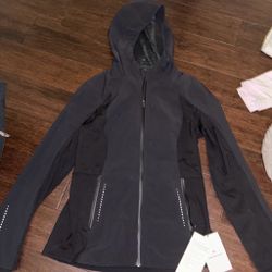 Black Lululemon jacket NEVER WORN size 10