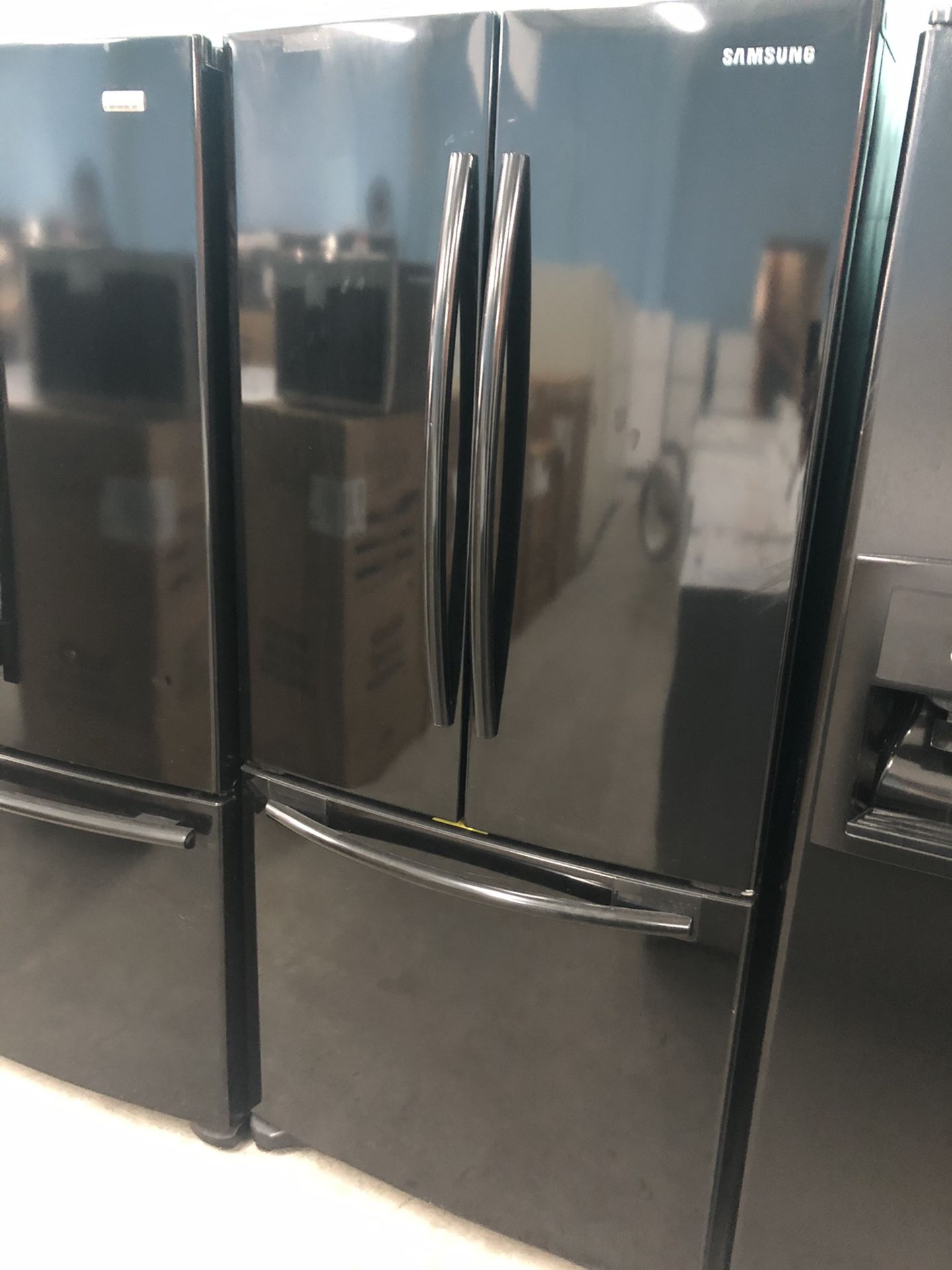 Black French Door Refrigerator With Ice Maker